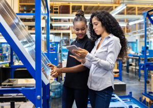 Two women working